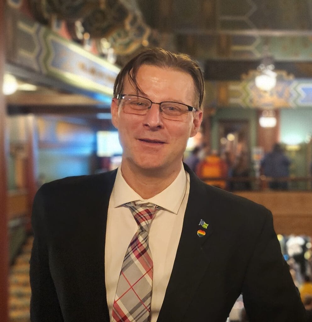 Mike Riffon's headshot of him smiling